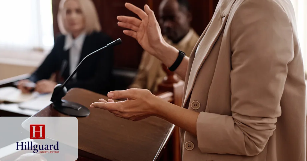 Attorney speaking at a podium during a legal hearing