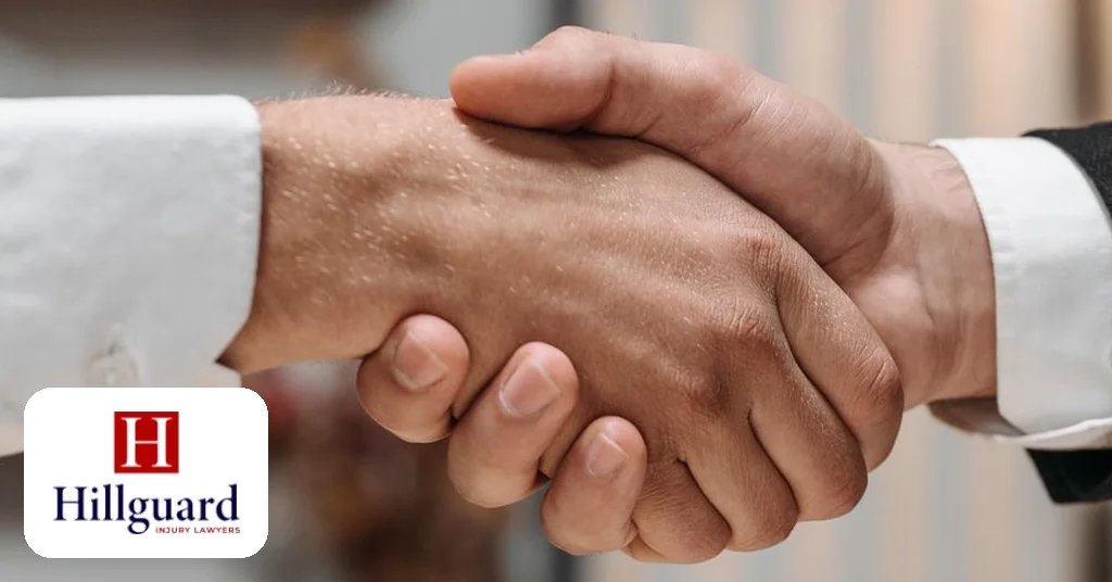 A handshake at an attorney's desk — consulting a California dog attack lawyer
