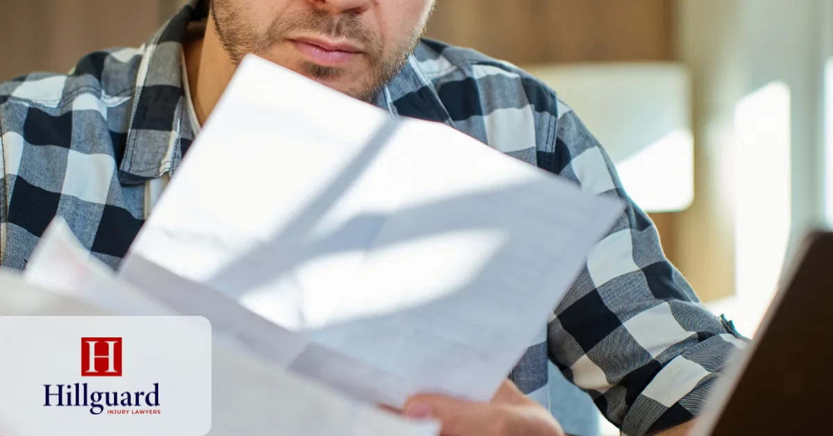 Reviewing California Dog Bite Injury Claim Documents California dog bite victim reviewing medical bills and insurance claim paperwork