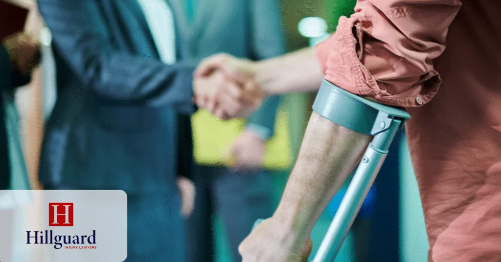 Injured client meeting with a lawyer for assistance.