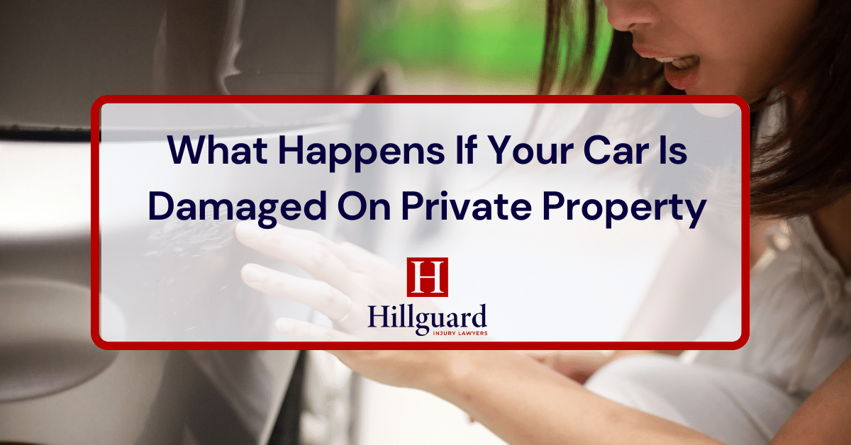 Driver inspecting car damage on private property.